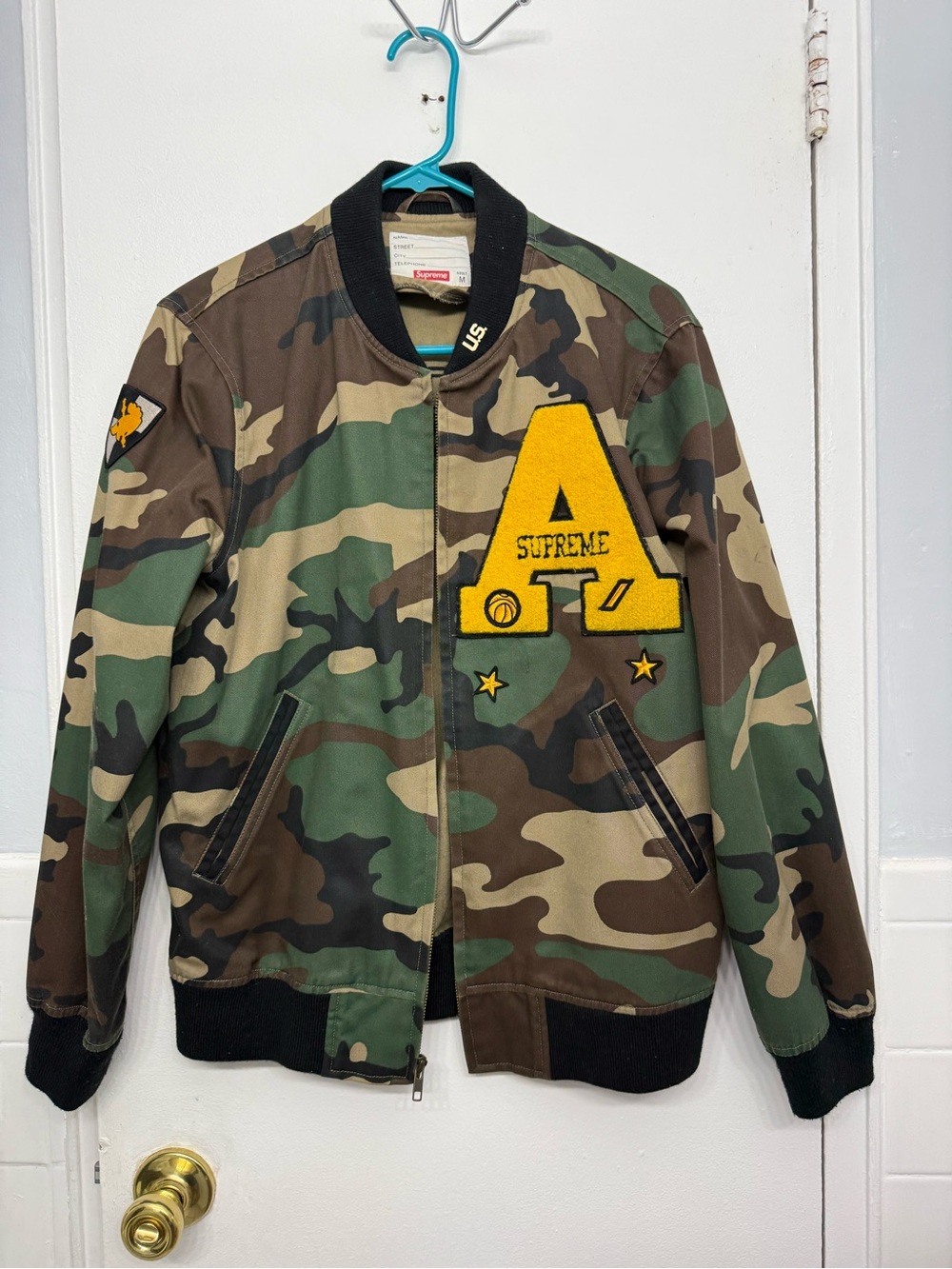 Supreme Camouflage Bomber Jacket with Yellow Appliqué A